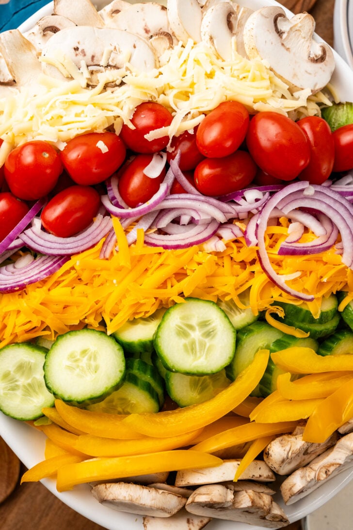 Salad For A Crowd is loaded with flavor and texture and has something for everyone. It comes together in just 15 minutes and makes the best fresh, healthy side dish!