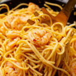 Buttery, flavorful Shrimp Scampi With Pasta is a delicious recipe that's easy to make with just a few simple ingredients is ready to serve in 30 minutes.