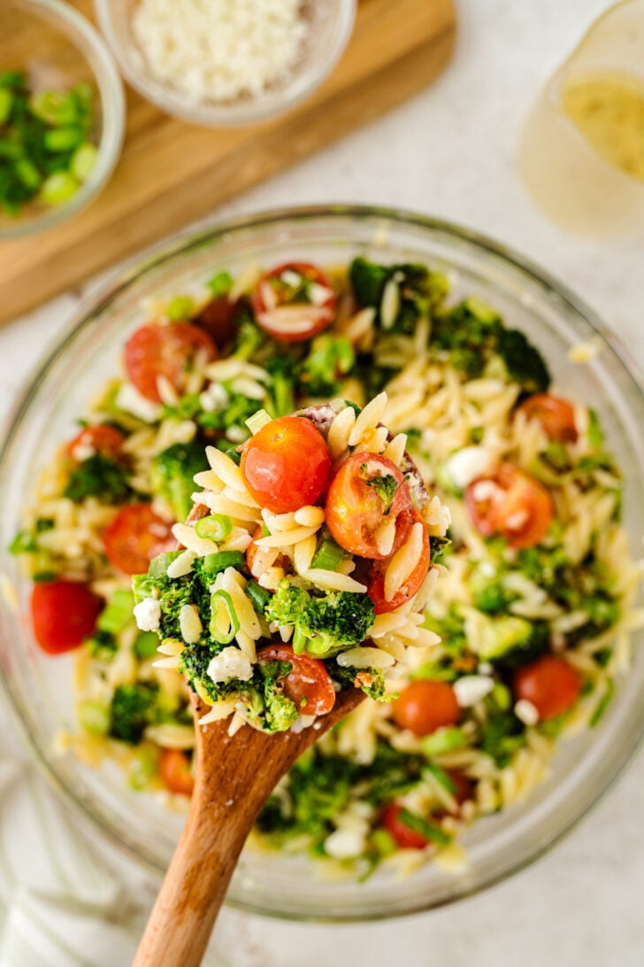 Packed with flavor and texture, Broccoli Orzo Pasta Salad combines tender pasta, creamy feta cheese, and crisp broccoli florets for a bright and fresh side dish that's simple to make.