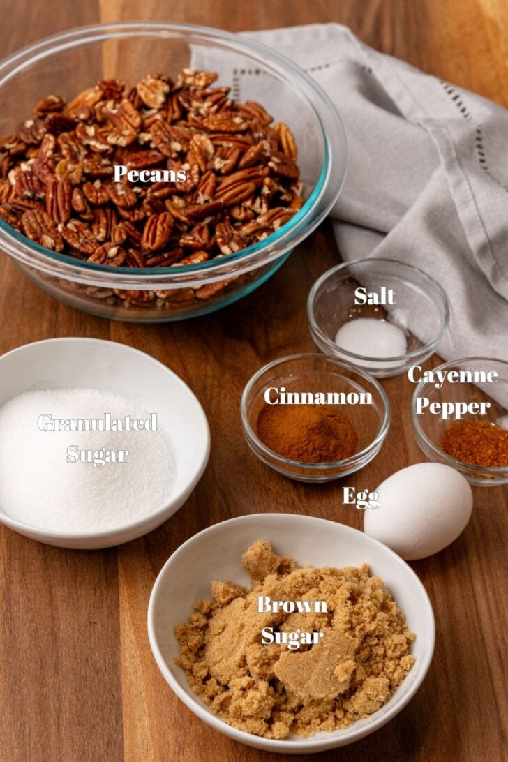 Glass bowls with pecans and other ingredients to make Southern candied pecans.