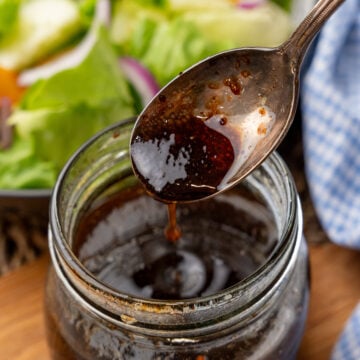 Homemade balsamic vinaigrette dressing in a glass jar