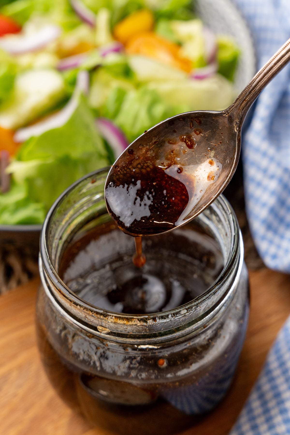 Homemade balsamic vinaigrette dressing in a glass jar