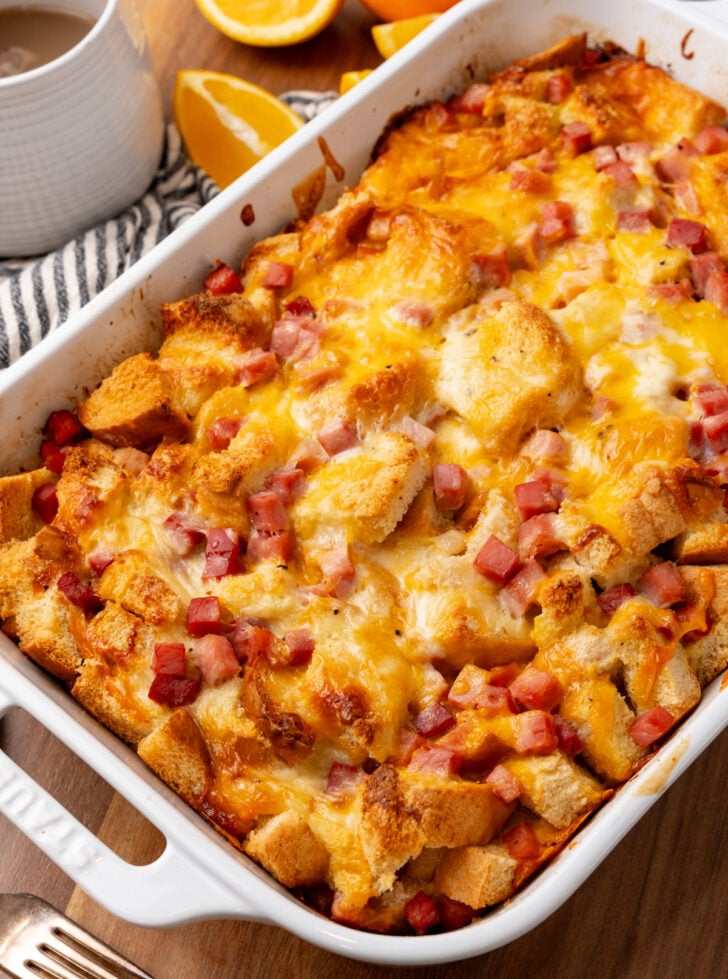 Ham and Cheese Strata is a simple overnight casserole recipe that's so good for breakfast, brunch, or even a weeknight meal! Made with eggs, bread, ham, and two kinds of cheese, this make-ahead recipe lets you relax and enjoy time around the table with family and friends.