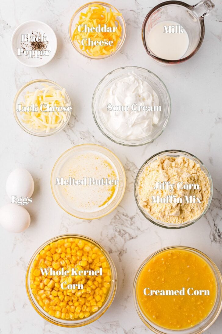 Glass bowls and containers with ingredients for classic Southern cornbread pudding.
