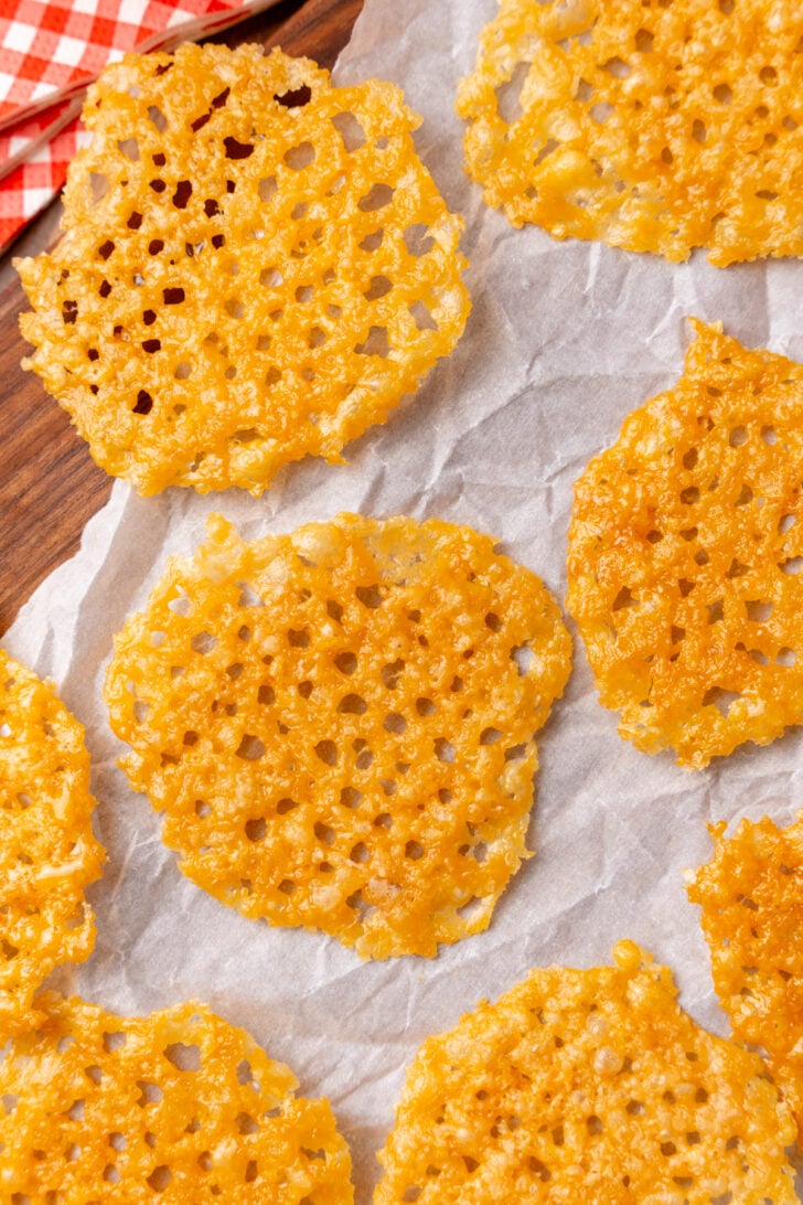 Make these Parmesan Cheese Crisps as soon as you can! They are amazingly yummy as a snack, on a charcuterie board, or salads. Gluten-free, keto-friendly, and flavorful, these homemade cheese rounds are a delicious low-carb treat!