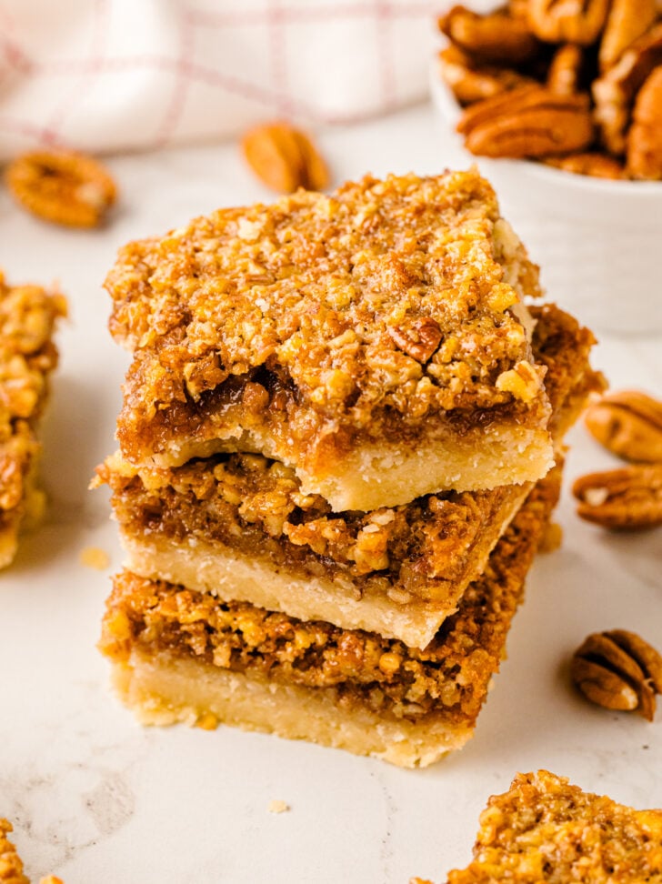 These Pecan Pie Bars are the perfect hand-held twist on the classic Southern dessert! They have all the gooey, nutty magic of pecan pie with none of the hassle. They’re equal parts indulgent and effortless, making them perfect for wowing a crowd or treating yourself on a cozy afternoon.