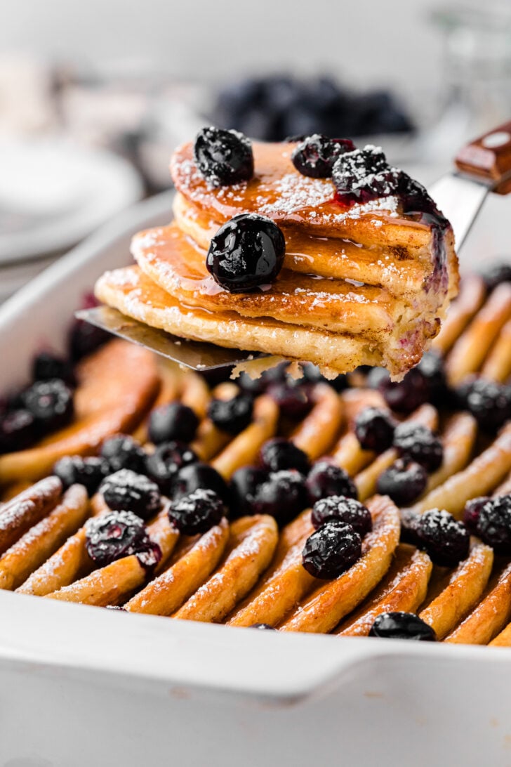 Pancake Casserole is the ultimate breakfast upgrade! Combining pancakes' soft, fluffy texture with a creamy custard base, it’s like French toast and pancakes came together for one amazing bite. Add in the bursts of sweet-tart blueberries, and you have a make-ahead dish ideal for entertaining or a cozy weekend breakfast.
