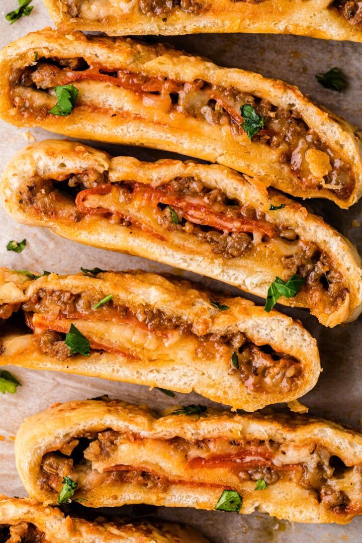 Stromboli with sauce Homemade Baked Stromboli is everything you love about pizza rolled into a golden, flaky crust! Packed with bold flavors from Italian sausage, pepperoni, and melted cheese, it’s a quick and satisfying recipe that's perfect as a hearty appetizer, a family-friendly dinner, or even a game-day snack.