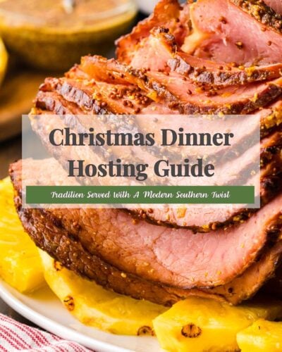 Sliced honey-glazed ham with mustard crust and pineapple garnish, Christmas Dinner Hosting Guide Pinterest pin