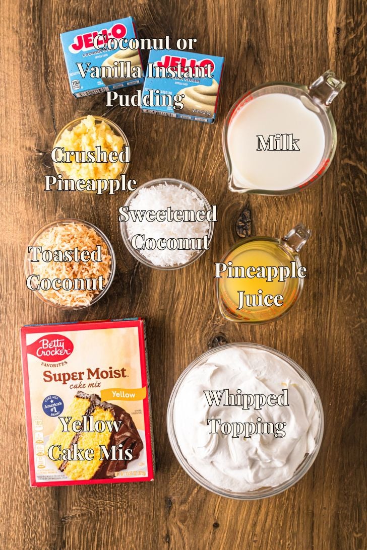 Ingredients for pineapple coconut poke cake including cake mix, crushed pineapple, coconut pudding, and toasted coconut flakes.
