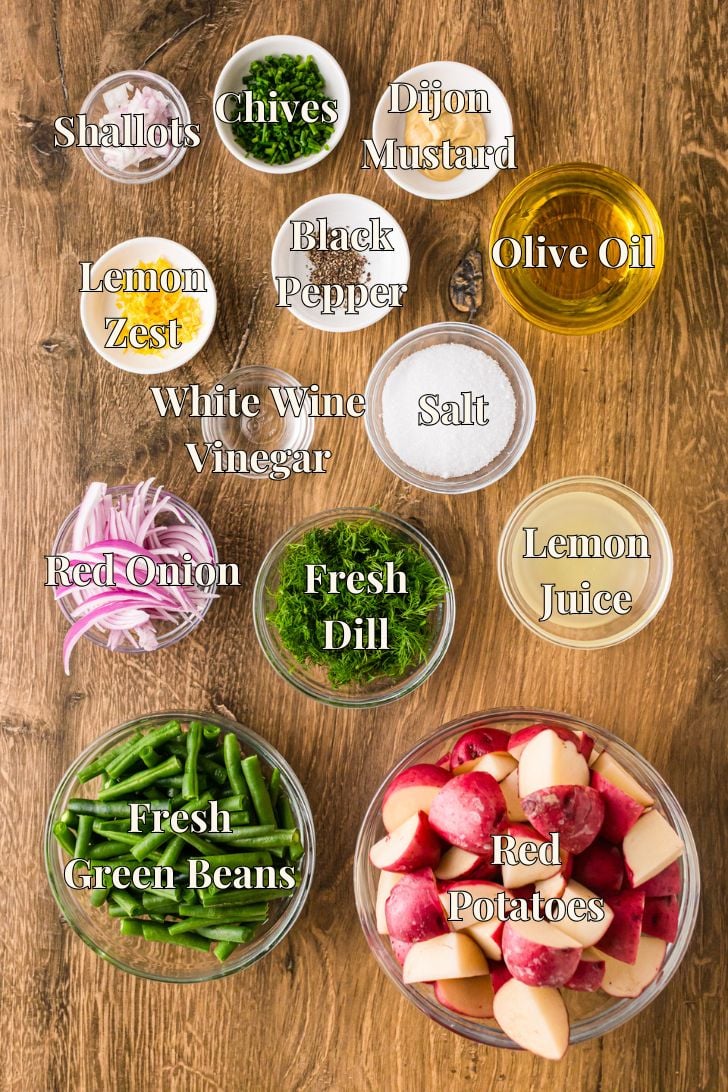 Labeled green bean and potato salad ingredients: green beans, red potatoes, dill, lemon dill vinaigrette items.
