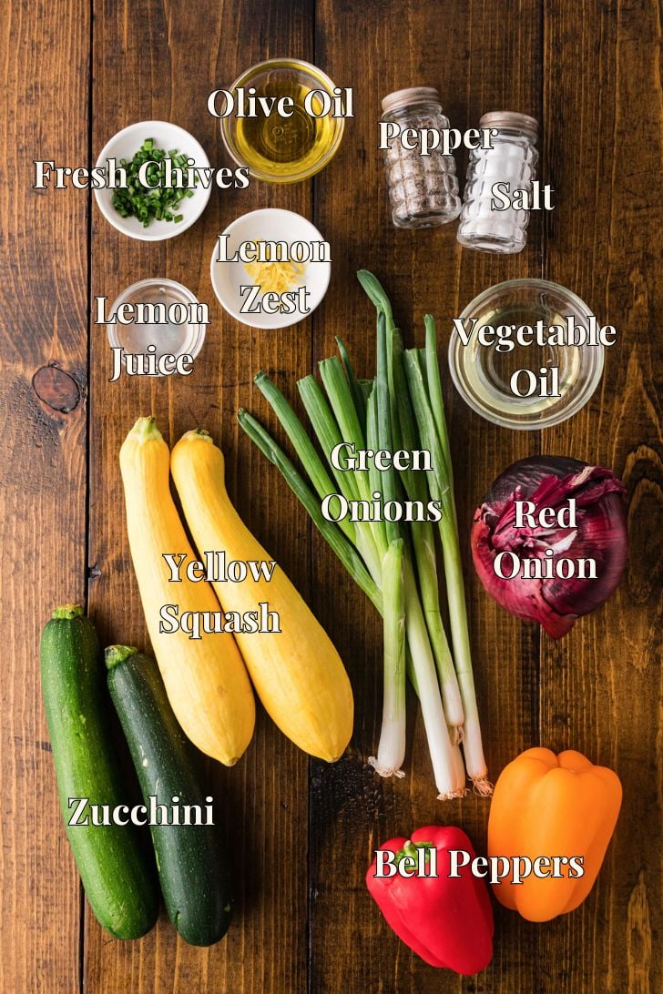 Grilled vegetable ingredients including zucchini, squash, and bell peppers.
